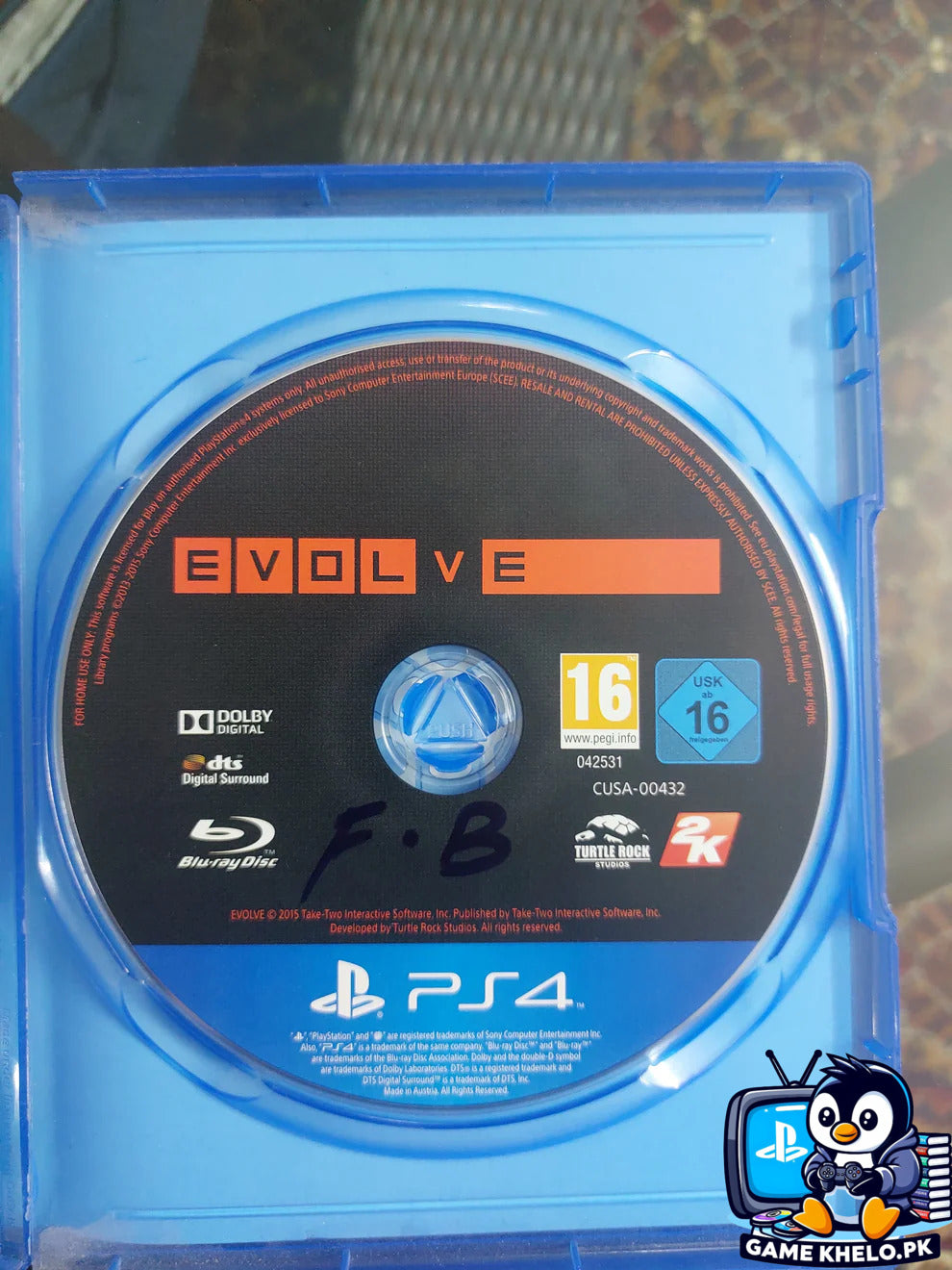 Evolve PS4 Disc Closeup - Game Khelo Pakistan