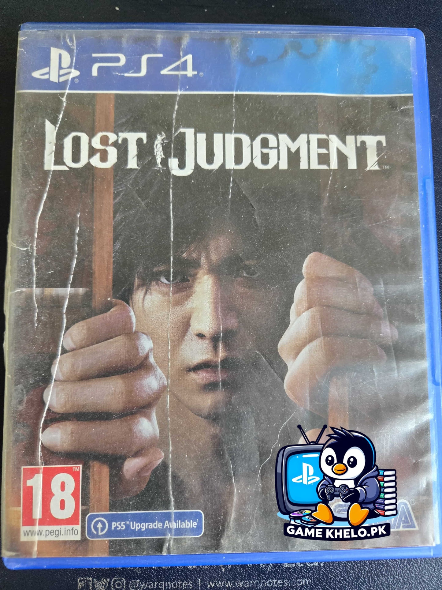 Used Lost Judgment PlayStation 4 game case with 3-day warranty from GameKhelo Pakistan showing Takayuki Yagami using martial arts abilities
